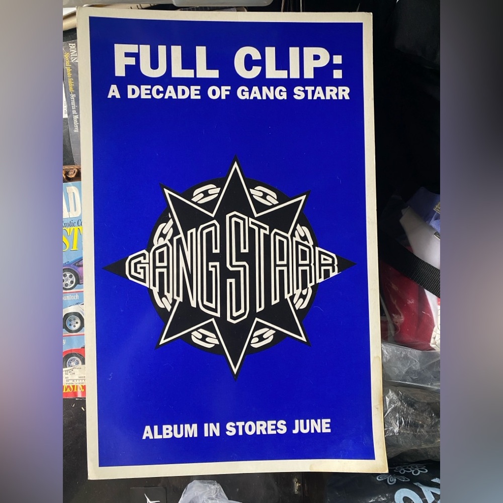 Gang Starr Full Clip poster with bold blue and white design. Perfect for music